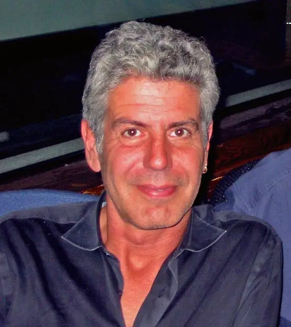 Anthony Bourdain, “Anthony Bourdain being interviewed at WNYC” by WNYC New York Public Radio, cropped and edited by Daniel Case, is licensed under CC BY 2.0. Source.