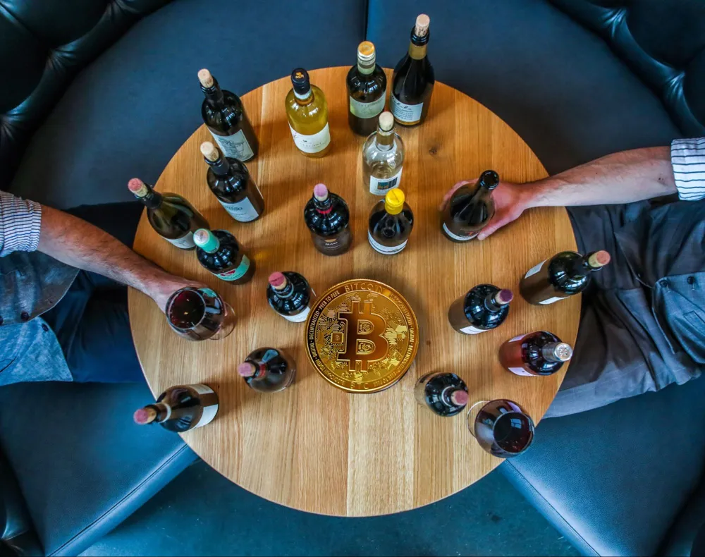 Cryptocurrency and fine wine could both be a good investment alternatives for many people (Photo: originally by Zachariah Hagy on Unsplash, edited by Krystal Wen)