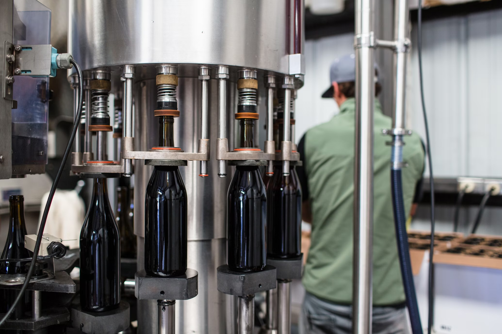 Automatic bottling lines limit human error and ensure consistency in each bottle (Photo by Vindemia Winery on Unsplash)