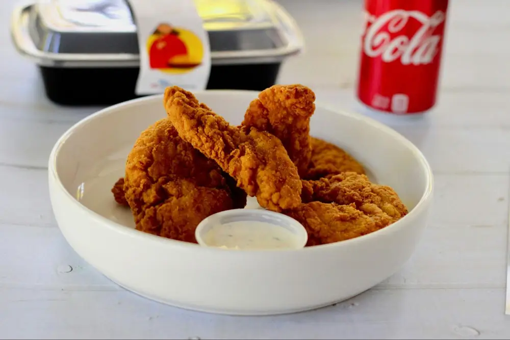Let VinoVoss help you find the perfect pairing for your favorite chicken tenders this National Chicken Tender Day. (Photo by logan jeffrey on Unsplash)