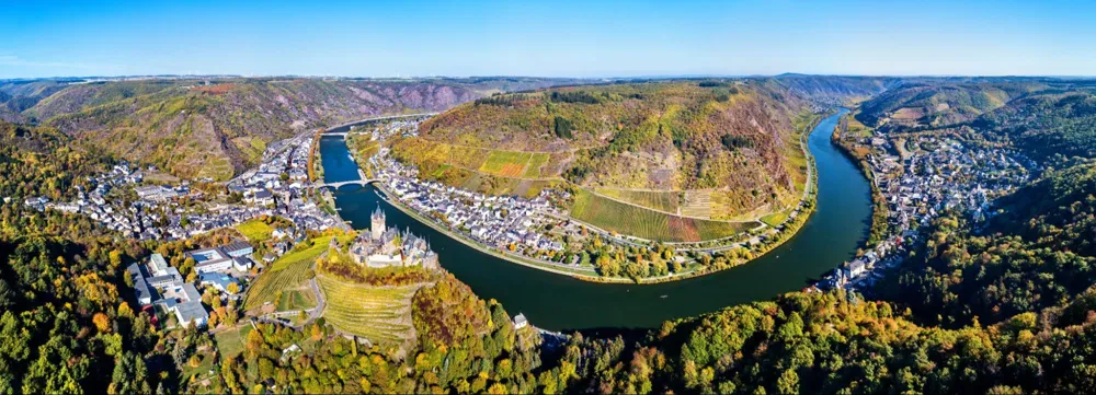 Aerial panorama of Cochem with the Reichsburg Castle and the Moselle river. Germany (Credit: <a href="https://stock.adobe.com/de/contributor/200808426/leonid-andronov?load_type=author&prev_url=detail">Leonid Andronov</a>, stock.adobe.com)