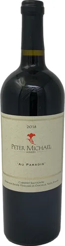 Bottle of Peter Michael Au Paradis Cabernet Sauvignonwith label visible