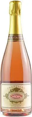 Bottle of R.H. Coutier Cuvée Rosé Brut Champagne Grand Cru 'Ambonnay'with label visible
