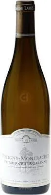 Bottle of Domaine Larue Puligny-Montrachet Premier Cru 'La Garenne'with label visible